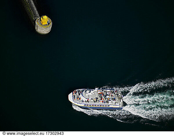 Aerial view of whale watching boat returning to the port of Reykjavik