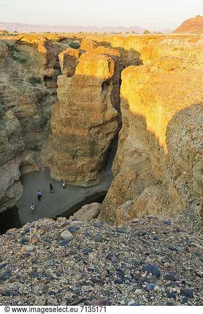 Africa  Hiking  Namib  Naukluft  Park  Namibia  Sesriem  Canyon  people  rocks  tourism  tourists  vertical