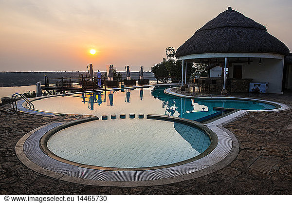 Africa  Uganda  Swimming pool above the Kazinga channel at sunset  Queen Elizabeth National Park