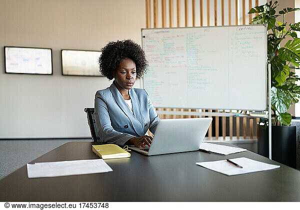 African American businesswoman using laptop
