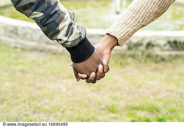 african couple in love holding hands