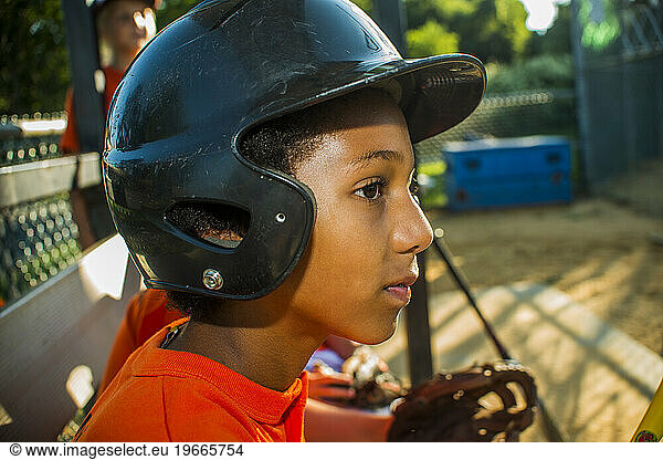 Afro American boy on the little league team