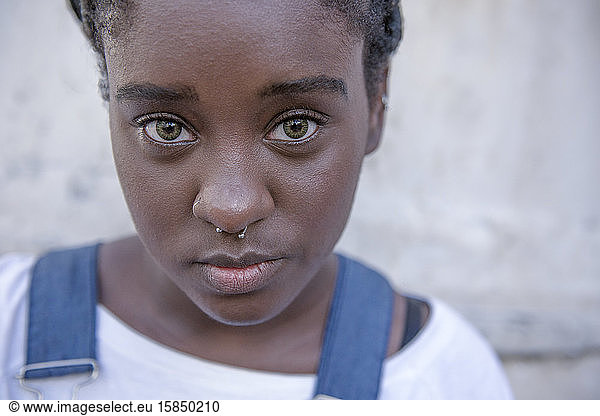 Afro-Brazilian girl with green eeditorial