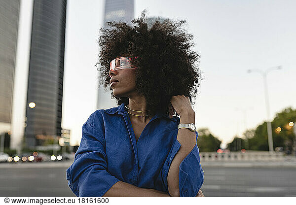 Afro woman wearing smart glasses