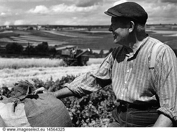 agriculture  farmers  farmer in front of field  1950s