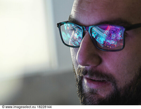 AI Technology  Circuit board reflected in glasses