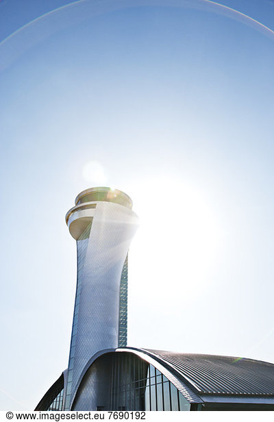 Air traffic control tower and blue sky