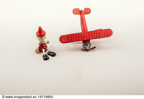Airplane  Bullet and wooden pinocchio with his long nose