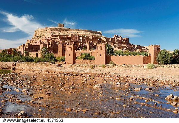 Ait Benhaddou with shallow water of Ounila River or Wadi Mellah near Ouarzazate Morocco