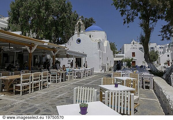 Alley with alleyway cafe and church  Mykonos Town or Chora  Mykonos  Cyclades  Greece  Europe