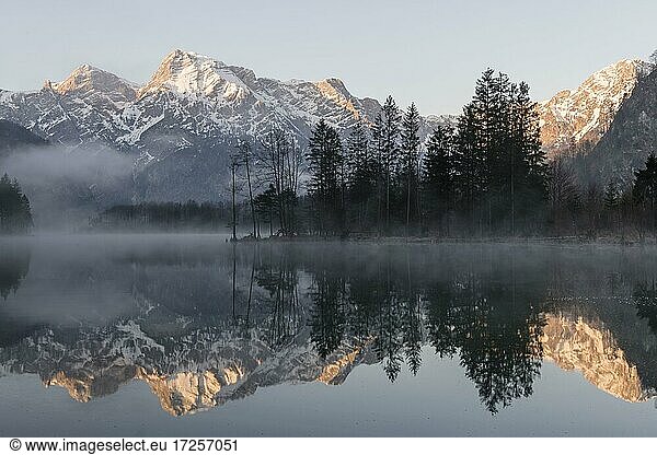 Alpine lake with reflection  fog atmosphere  Totes Gebirge  Grünau  Almtal  Salzkammergut  Upper Austria  Austria  Europe
