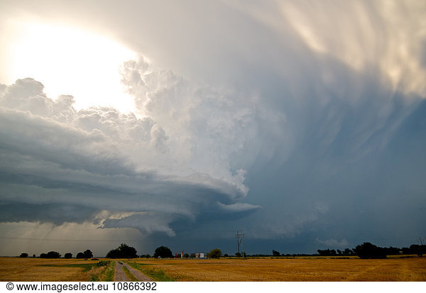 Amazing structure evolves in a rotating supercell as two storms collide  looking north toward Piedmont  Oklahoma  USA