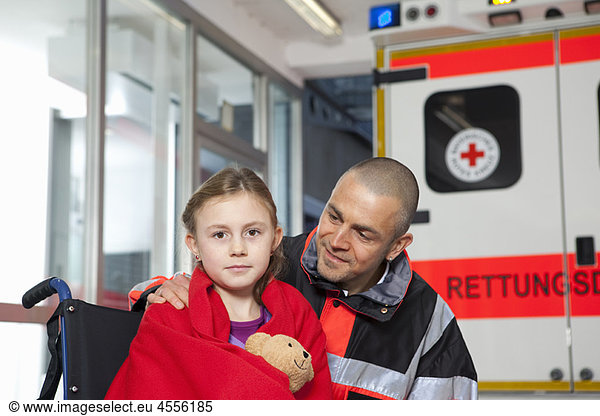 Ambulance man caring about girl