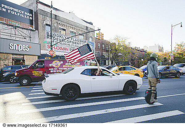 American Flag and Car during Celebration of President-Elect Joe Biden  Brooklyn  New York  USA