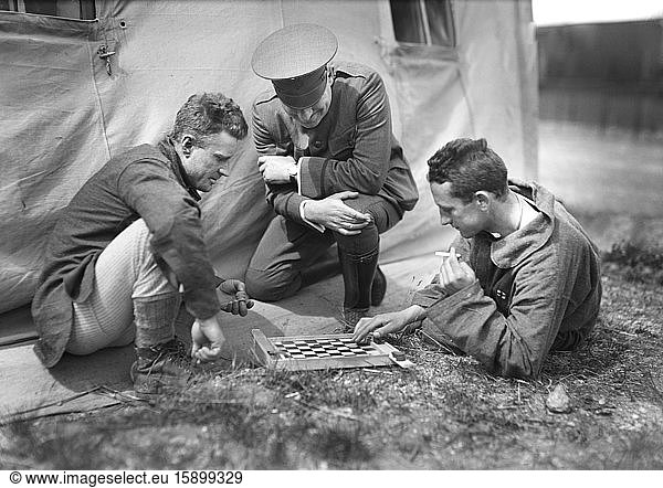 American Red Cross Man refereeing a Game of Checkers played by two Patients in the American Military Hospital No. 5 Auteuil France Lewis Wickes Hine American National Red Cross Photograph Collection June 1918