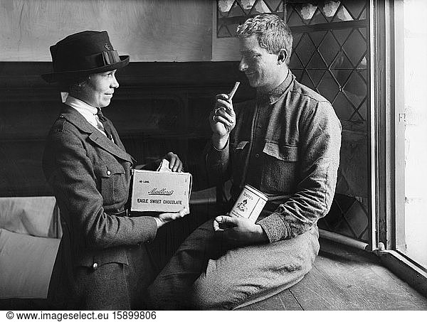 American Soldier receiving Chocolate from Female American Red Cross Worker  Base Hospital No. 27  Tours  France  Lewis Wickes Hine  American National Red Cross Photograph Collection  October 1918