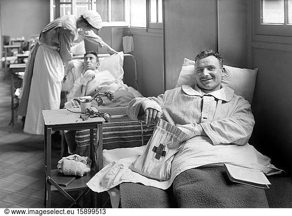 American Soldier with American Red Cross Comfort Bag in the American Military Hospital No. 1  which is supported by the American Red Cross  Neuilly  France  Lewis Wickes Hine  American National Red Cross Photograph Collection  June 1918