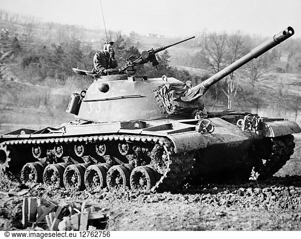 AMERICAN TANK 1944-1945. An American soldier patrols in an armored tank during World War II c1944-1945.