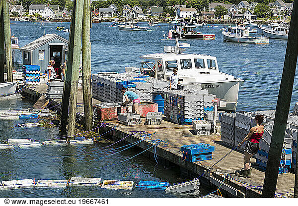An active wharf at the Vinalhaven Fishermen's Co-op in Vinalhaven  Maine.