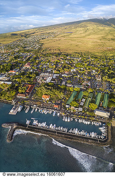 An aerial view of Lahaina harbor and town including the Pioneer Inn and West Maui Mountains  Maui  Hawaii  USA. Three images were combined for this panorama; Lahaina  Maui  Hawaii  United States of America