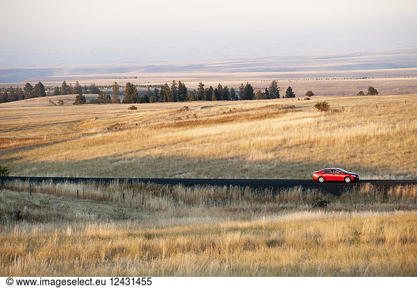 An automobile on the road in eastern Washington State  USA