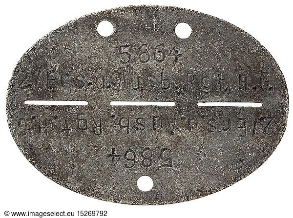 An identification tag division 'Hermann-GÃ¶ring' Feinzink (migriert) mit vs. Bezeichnung '5864 - 2./Ers.u.Ausb.Rgt. H.G.'  rs. ohne Markung. historic  historical  Air Force  branch of service  branches of service  armed service  armed services  military  militaria  air forces  object  objects  stills  clipping  clippings  cut out  cut-out  cut-outs  20th century