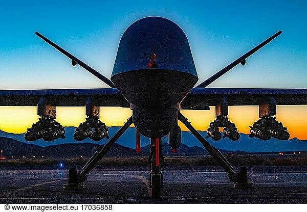 An MQ-9A Reaper assigned to the 556th Test and Evaluation Squadron sits on the ramp at Creech Air Force Base  Nev.  Sept. 10  2020. This was the first flight test of the MQ-9 carrying eight Hellfire missiles.