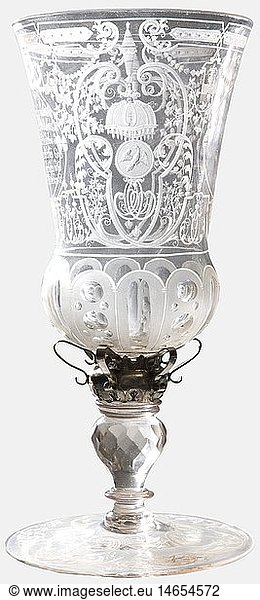 An ornate cut Bohemian glass goblet  a gift to an officer  ca. 1860 Discoloured glass with finely cut decoration. Circular foot with facetted stem. The upper balustre surrounded by a silver cuff. Bulbous  lense-cut bowl. The glass cut in the elaborate style of the 18th century. The front with a cartouche bearing the motto (transl.) 'When timbals sound  when pieces blare  then valour grows: and I deride  sans vengeance  the enemies' fury'. Flanked by Prussian eagles surmounted by a canopy. Height 32.5 cm. historic  historical  19th century  Prussian  Prussia  German  Germany  militaria  military  object  objects  stills  clipping  clippings  cut out  cut-out  cut-outs  vessel  vessels  cup  trophy  cups  trophies  goblet  goblets  pot