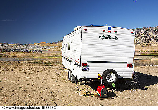 An RV that until recently would be 40 feet underwater on the lake bed of Lake Isabella near Bakersfield  East of California's Central valley which is at less than 13% capacity following the f