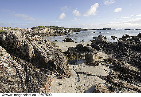 An unspoilt wild beach at low tide seen from Fidden Farm  on the south coast of the Isle of Mull; Scotland  UK.