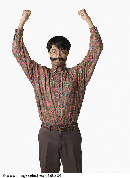 Angry Indian man with arms raised