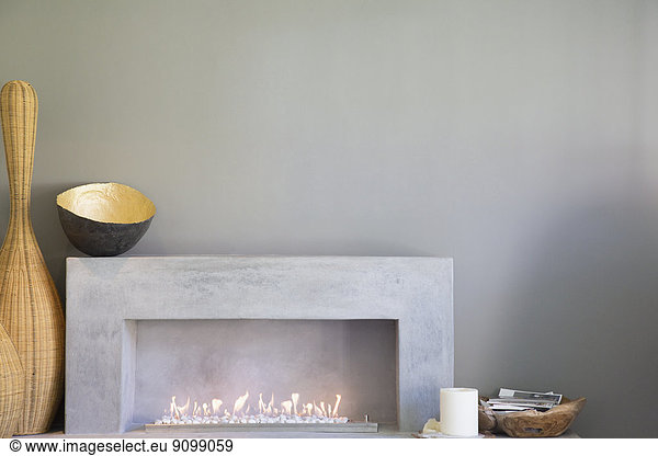 Apple art above fireplace in modern living room
