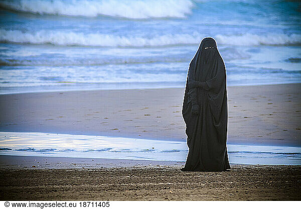 Arab woman on the beach  Bali  Indonesia.