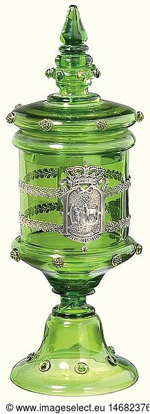 Archduke Franz Ferdinand of Ã–sterreich-Este - a covered goblet from Konopischt.  A glass goblet of green Bohemian glass with partially gilded grape and burl decoration. Surrounded by decorative silver oak leaves and Hubertus scene with the inscription 'Waidmanns Heil' framed by the Archduke's crowned reverse monogram 'FF'. Height 39 cm. This piece comes from Konopischt Castle  the Archduke's summer residence in Bohemia. In 1887 Archduke Franz Ferdinand (1863 - 1914)  later heir to the throne  acquired the castle and had it restored in the neo-Gothic style between 1889 - 1894. Even today  along with the arms collection  the castle shelters arts and crafts from the Gothic  Renaissance  and Baroque periods as well as a collection of sacred antiquities concerning St. George. historic  historical  19th century  Imperial  Austria  Austrian  Danube Monarchy  Empire  object  objects  stills  clipping  clippings  cut out  cut-out  cut-outs  vessel  vessels
