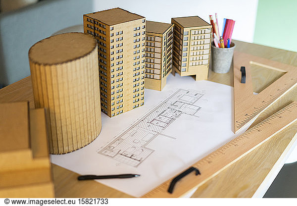Architectural model and plan on table