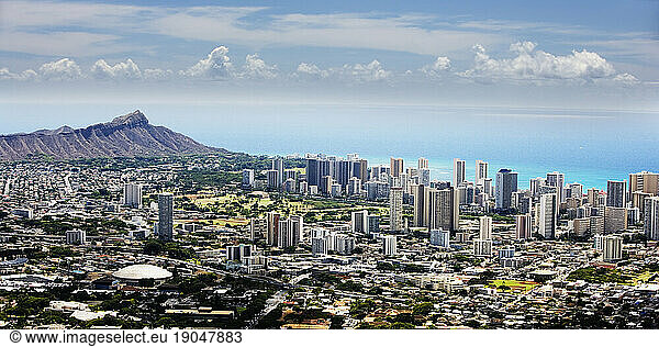 Ariel view of Diamond Head State Monument  and downtown Honolulu in O'ahu  Hawaii.