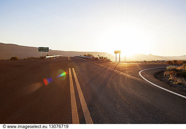 Arizona  View of road in desert at sunset
