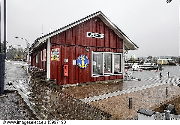 Arkosund  Sweden The Baltic Sea small boat harbour and harbour office.