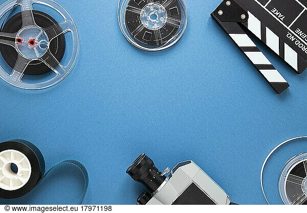Arrangement cinema elements blue background with copy space