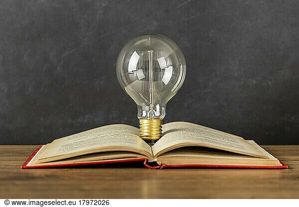 Arrangement with book light bulb
