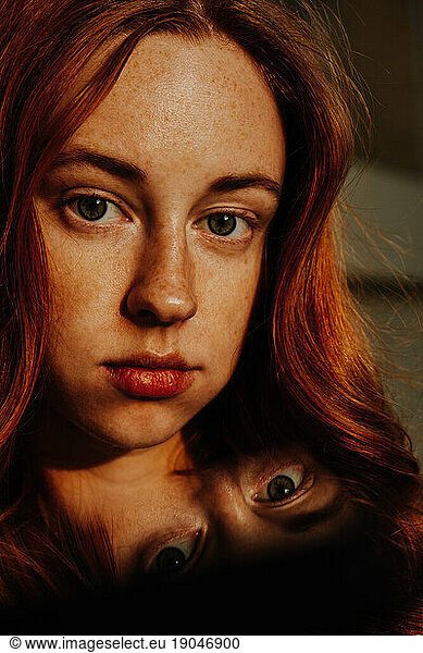 Art Portrait of Girl with Freckles at Sunset with Eyes` reflection