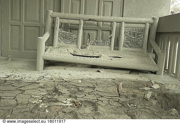 Ash-covered seat outside the house damaged by the recent volcanic eruption  Kepuharjo  Mount Merapi  Central Java  Indonesia  November 2010  Asia