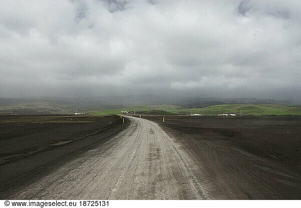 Ash storms from the eruption of Eyjafjallajokull Volcano near Skogar  Iceland blow across the coastal highway.