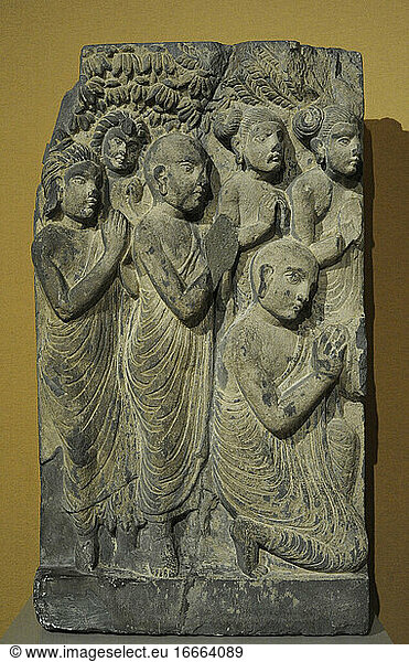 Asian Art. Monks and laymen from a scene of the Buddha sermon. Slate. Gandhara. 2nd-3rd centuries. AD. Until 1945. Musuem fur Volkerhunde  Berlin  Germany.