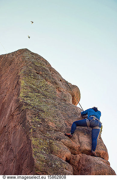 Asian Female Rock Climber at Garden of the Gods Colorado