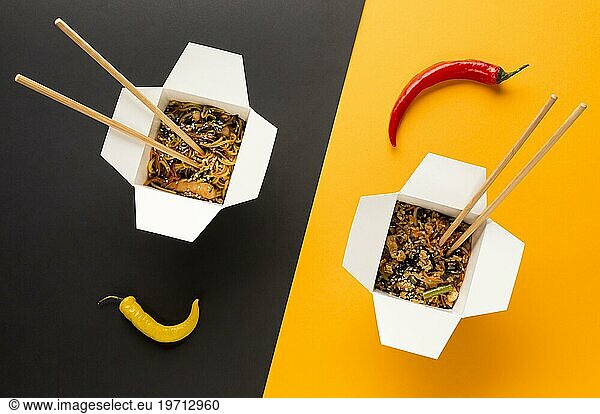 Asian food with chopsticks top view