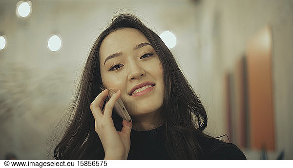 asian woman call with smartphone
