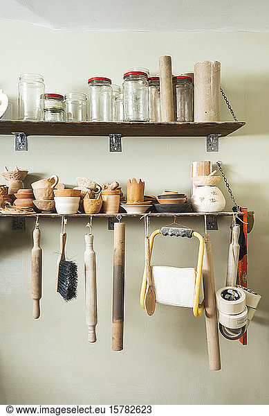 Assortment of tools on a shelf in a pottery