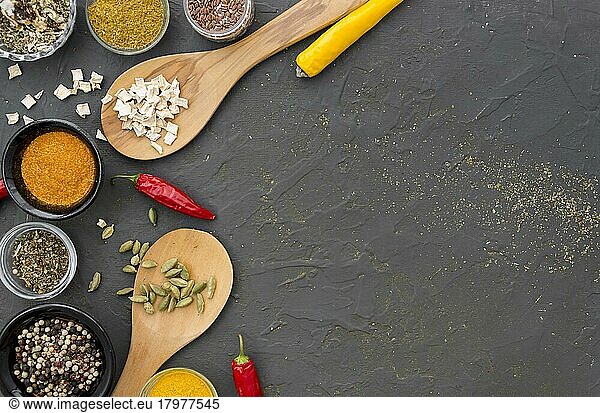 Assortment spices herbs grey copy space background