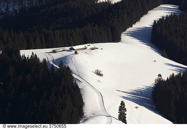 Aueralm alpine pasture on Mt. Fockenstein in wintertime near Tegernsee lake in Bavaria  Germany  Europe